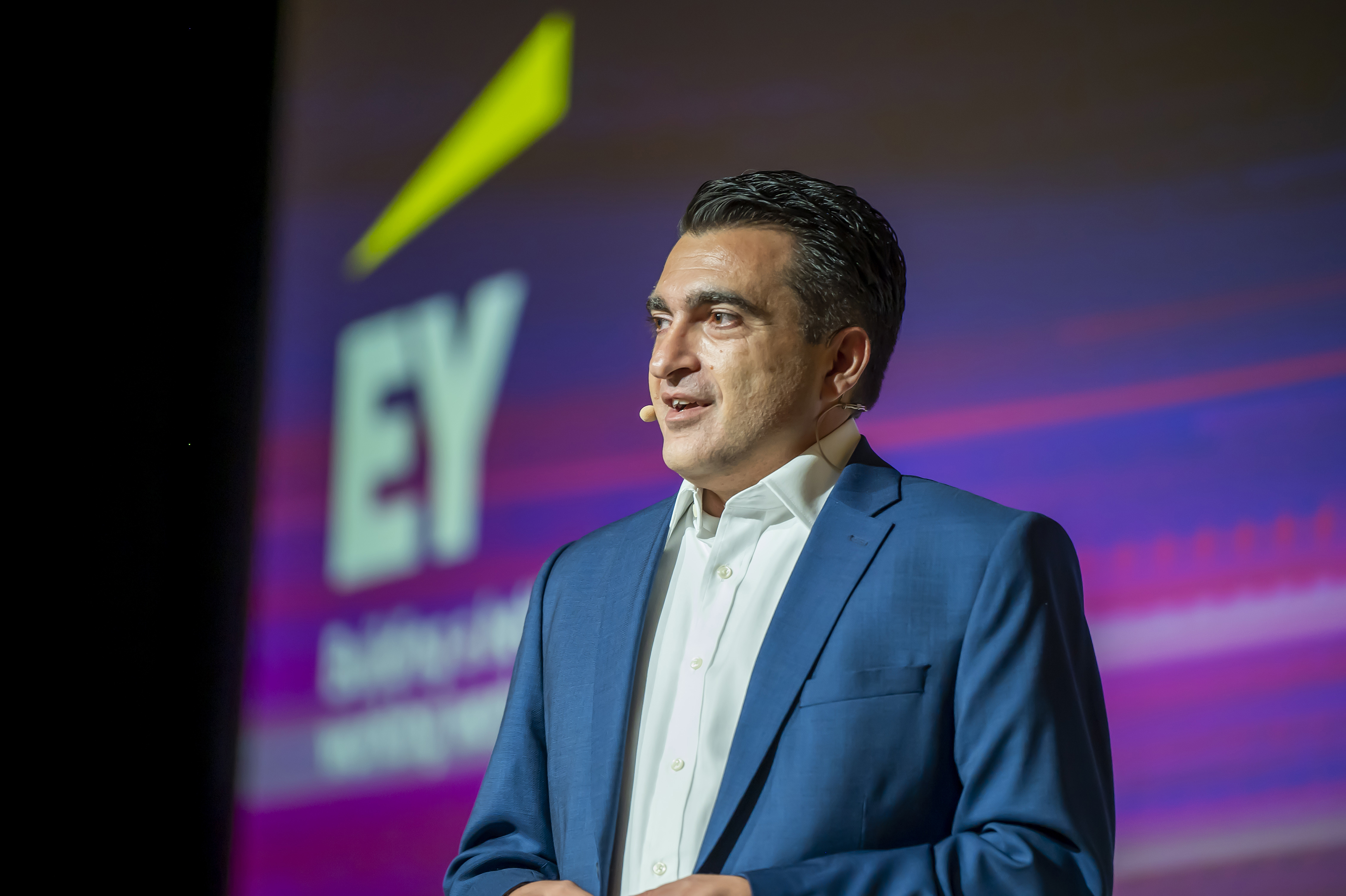 Michael Azzopardi on stage at EY Engage